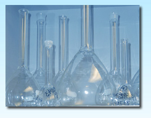 water analysis beakers on lab shelf - services provided list page